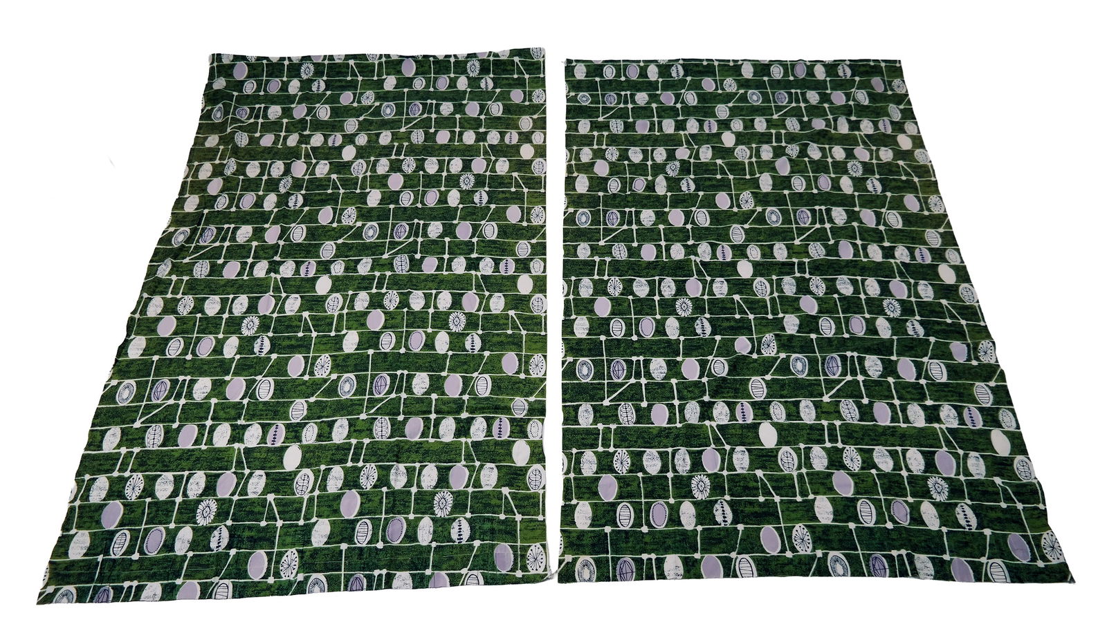 Lucienne Day "Strata" for Schumacher Curtains: Pair of printed plain-weave cotton curtains, "Schumacher Strata" by Lucienne Day, printed by F. Schumacher & Co., having white with green and black brick-like ground with oval motifs patterned in blac