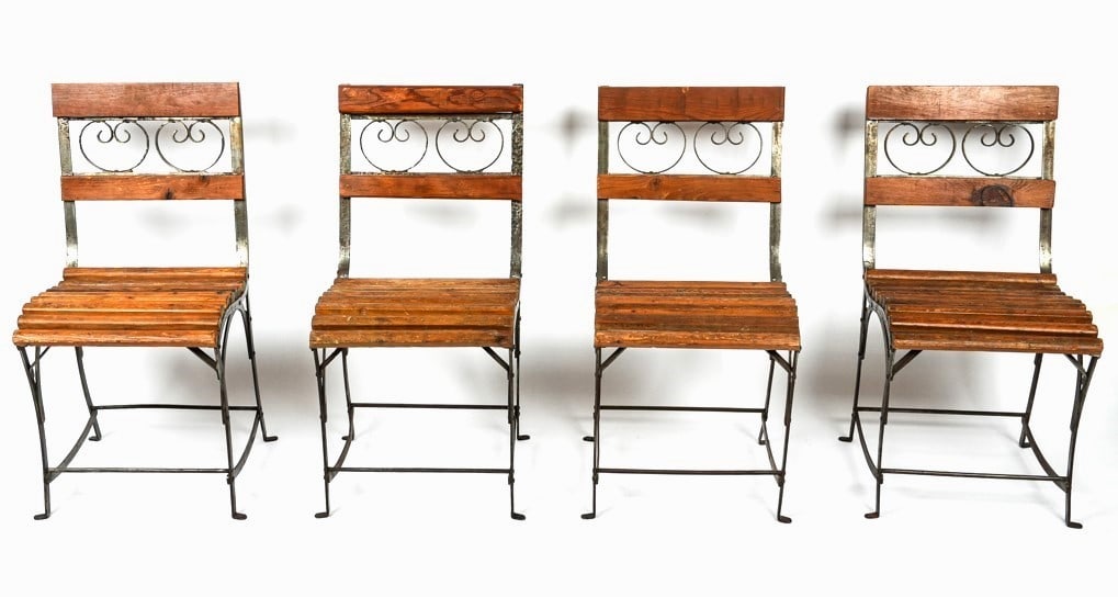 Four Antique French Wood and Wrought Iron Chairs: Four French bistro chairs, 19th century, with wood and wrought iron construction. [32" H x 16" W x 17" D; seat height: 17"]. Condition is good with scattered wear commensurate with age, some bolts rep