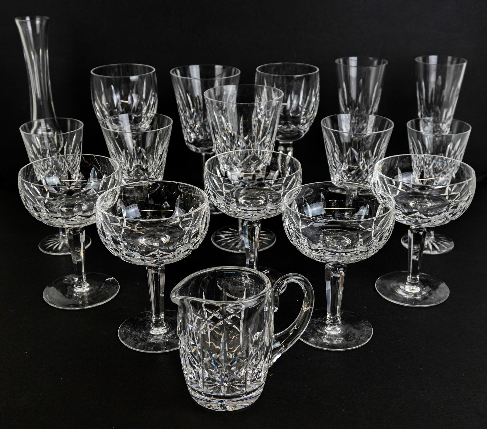 Assembled Set Waterford Crystal Stemware, 17: Waterford stemware comprising five Kildare coupe glasses, two Lismore goblets, two Lismore white wine glasses, two Lismore red wine glasses, two Lismore digestif glasses, two Lismore flutes, a Lismore