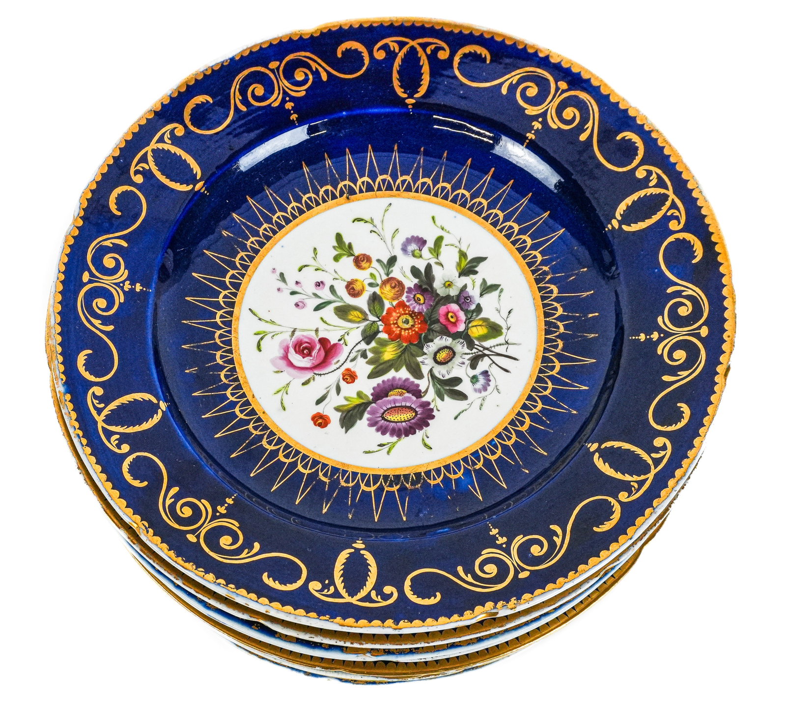 Cobalt Blue and Hand-Painted and Gilt Plates, 10: Ten porcelain plates, early 19th century, likely Coalport with hand-painted floral decoration to center and cobalt blue and gilt decoration along edge, unmarked. [9.25" Diameter]. Condition is good wi