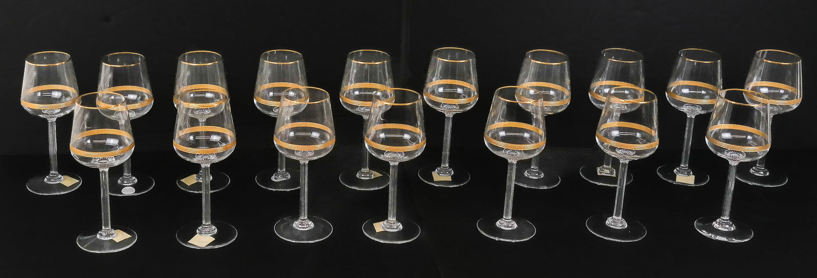 Baccarat "Athena" Gilt Crystal Water Glasses, 17: Set of 17 Baccarat crystal gilt threaded "Athena" pattern water glasses, marks to base. [8" H x 3" Diameter]. Overall condition is good. Property of and benefiting Columbia University in the City of N