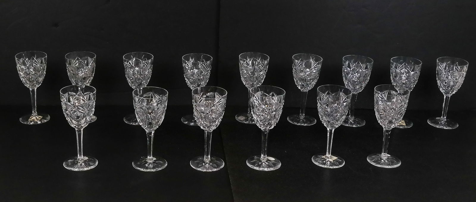 Baccarat "Lagny" Crystal White Wine Goblets, 15: Set of 15 Baccarat cut crystal "Lagny" pattern white wine stemware, marks to base. [7" H x 2.75" Diameter]. Overall condition is good, one rim with chip. Property of and benefiting Columbia University