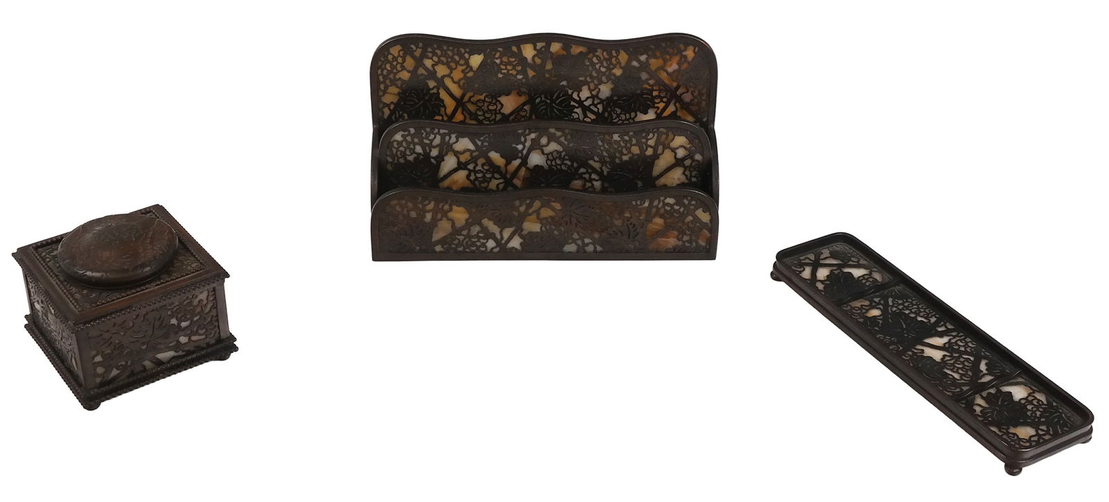 Tiffany Studios "Grapevine" Desk Accessories, 3: Tiffany Studios collection of three bronze and slag glass "Grapevine" pattern desk accessories, comprising pen tray, inkwell and letter holder, marked to base "Tiffany Studios" and numbered respective