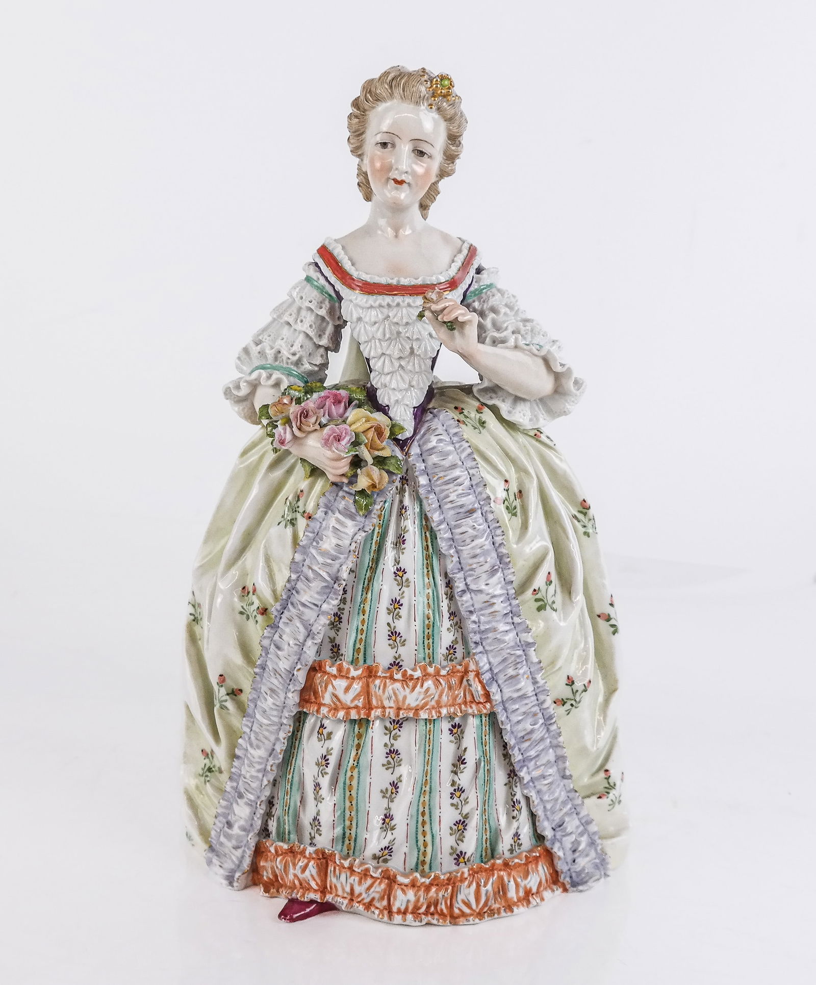 Capodimonte Porcelain Figure of a Woman: Capodimonte porcelain figure of a woman, 19th century, with hand-painted decoration, marked to base. [11.5" H x 7" W x 7" D]. Condition is good with minor scattered wear and a repair at neck. CABINET