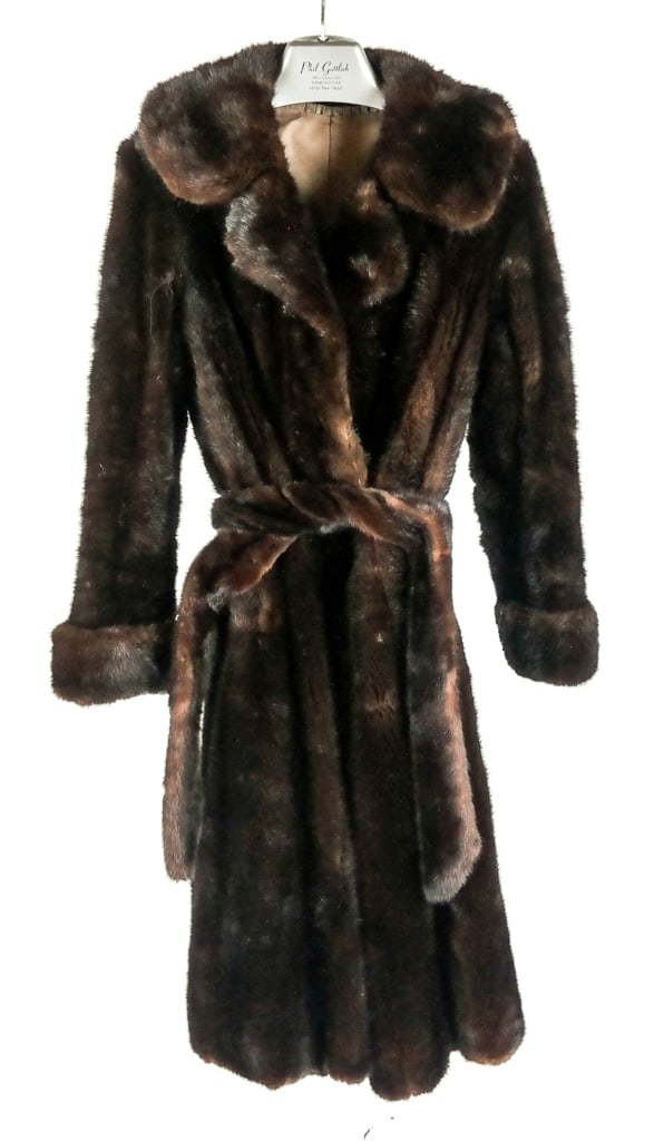 Belted Shorn Mink Coat: Shorn mink coat with loop and eye closure, spread collar, fully lined with BHD monogram to interior, invisible pockets, and a detached belt. [Neck to hem:45" ;shoulder to shoulder: 18"; bust: 19"; sle