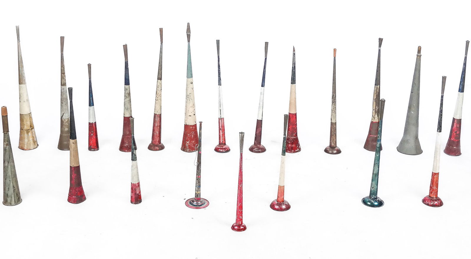 Collection Of Tin/Tole Horns: Collection of tin and tole party noisemakers, some colorful.