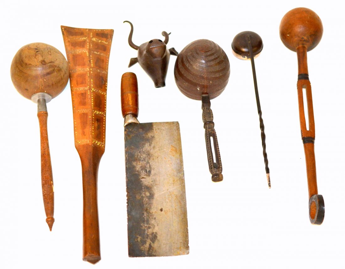 7 Carved African and Asian Cooking Articles: Comprises: horn and wood ladles, inlaid stirrer, and Korean cleaver. Accompanied by a steel bull's head. 7 items total.