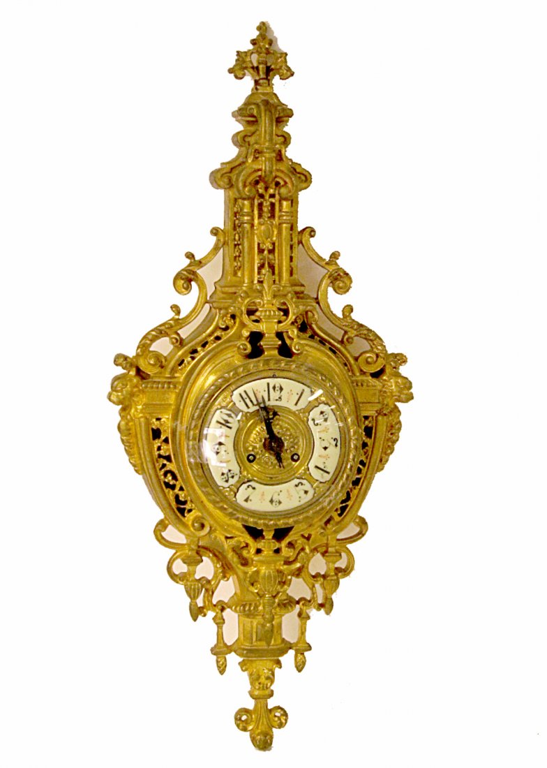 Antique Japy Freres et Cie Cartel Clock: Bronze doré beaux arts clock with reticulated and open work elements throughout. Bears partitioned enamel dial. Movement stamped "Japy Freres & Cie/ GDE Med. D'Honneur". [Overall: 12 1/4"W x 5"D x 29