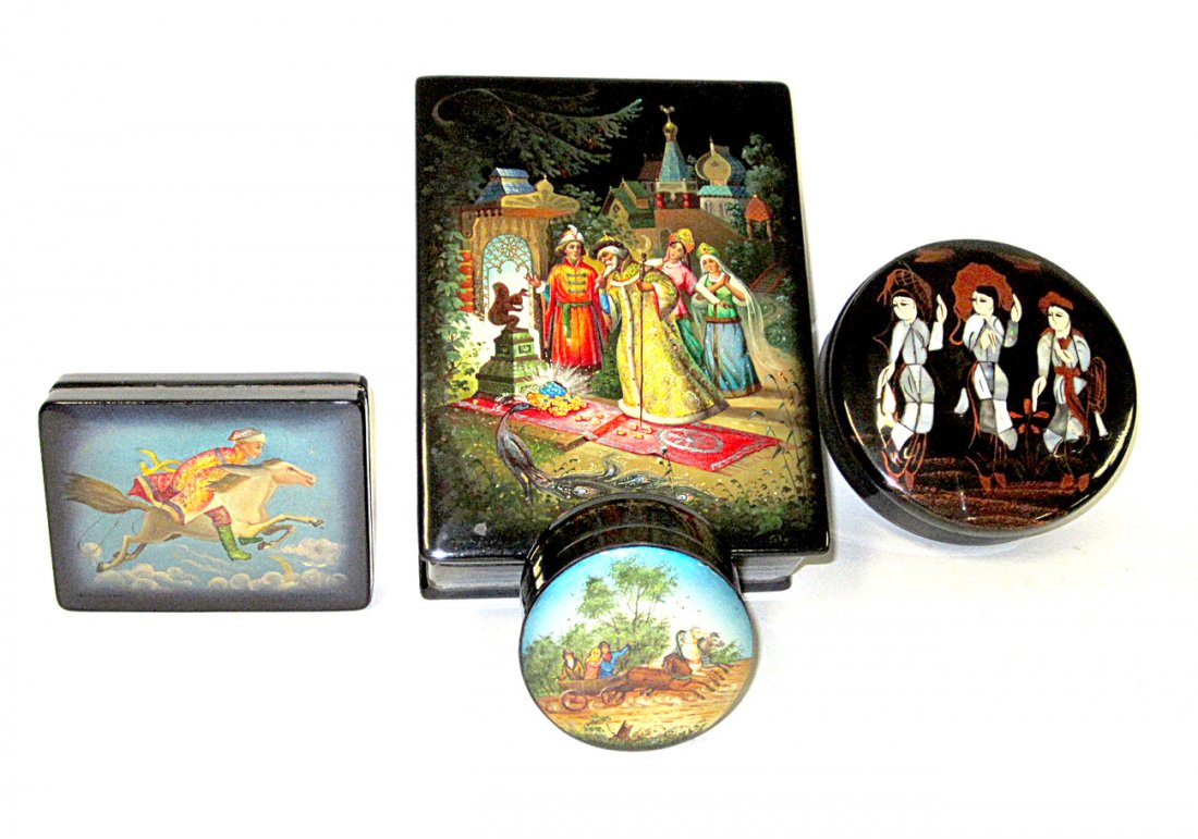 Four Lacquered Boxes: Four decorated boxes. Two marked: "Made in U.S.S.R. " Two are hinged. Good condition.