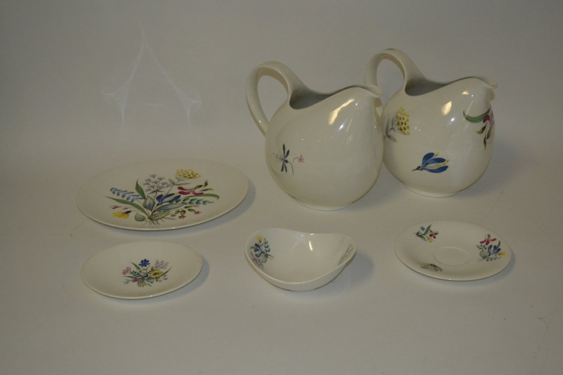 Eva Zeisel "Bouquet" Partial Dinner Service: Some items marked "Bouquet", others "Hallcraft". Comprises: 8 dinner plates; 6 dessert plates; 8 bread and butter plates; 8 ice cream bowls; 6 cups and 5 saucers; creamer and sugar bowl; and two pitch