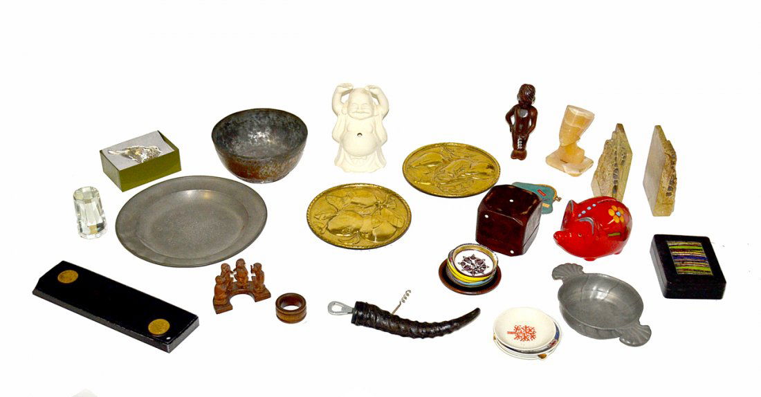 Mixed Lot: 19th/20th Century Decorative Items: Including: brass wall pockets, Italian ceramic piggy bank, 2 goat skin boxes, Christofle bird, desk accessories, mid-century enamel ash receivers, horn corkscrew, Asian carved stone bookends, and othe