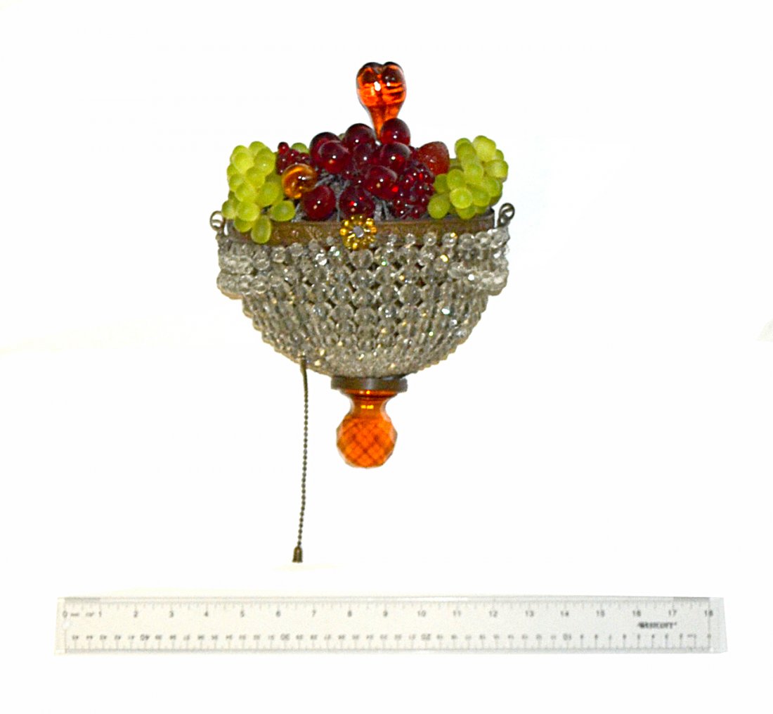 Single Italian Glass Beaded Fruit Sconce: Basket-form sconce with green, ruby, magenta and amber colored glass fruit element. Bears a single interior candelabra base socket. [8 1/2"W x 4 1/4"D x 9 1/4"H]