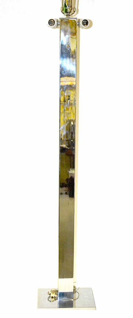 Modern American Chromed Steel Floor Lamp: Floor lamp with straight rectangular shaft on rectangular base. Bears two ceramic double edison-base sockets near top with single socket above [5 lights total]. [11"W x 8"D at base x 56 1/4"H]