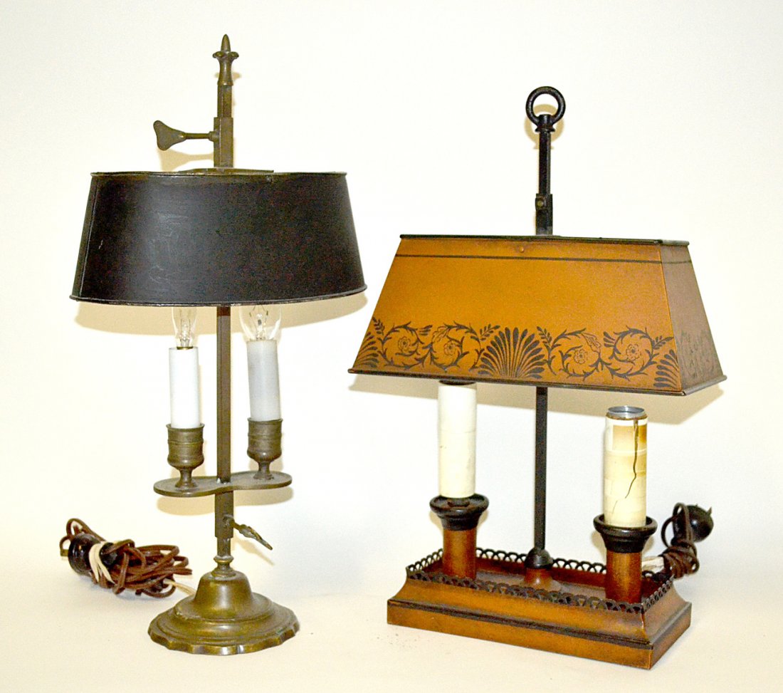 Two Vintage Bouillotte Lamps: Comprises: 1.) Bronze two light lamp with oval black tole shade [9"W x 17 1/2"D]. 2.) Amber painted tole lamp with rectangular shade [10"W x 16 1/8"H]. Both complete, need restoration.