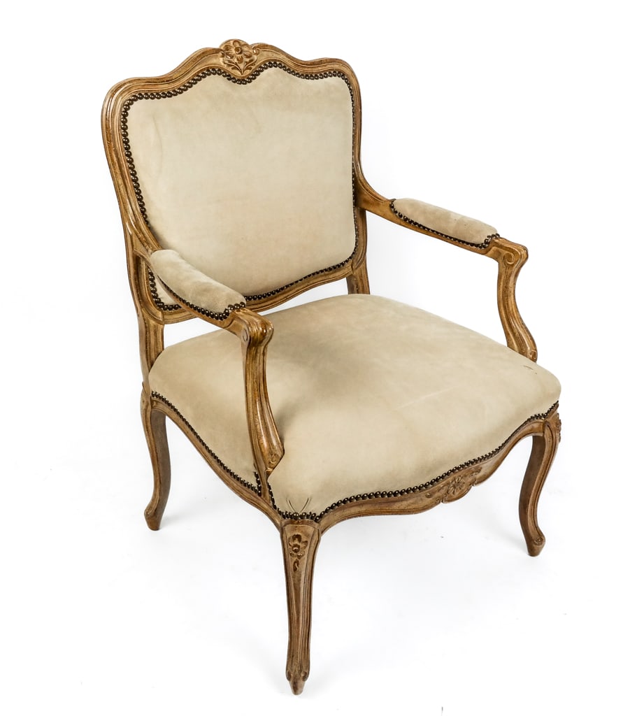 Louis XV Pickled and Carved Fauteuil: Louis XV picked and carved fauteuil, 20th century, with ecru colored upholstery. [37.5" H x 24" W x 23" D, Height to Seat: 17"]. Overall condition is good, upholstery slightly stained and soiled.