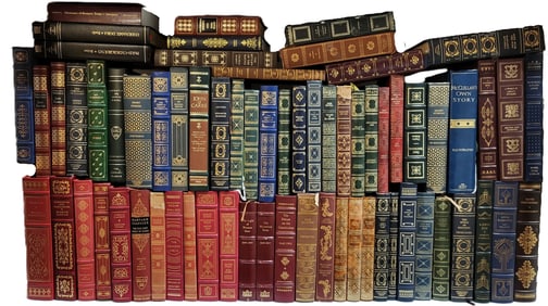 BOOKS: Three Shelves Of Leatherbound Books