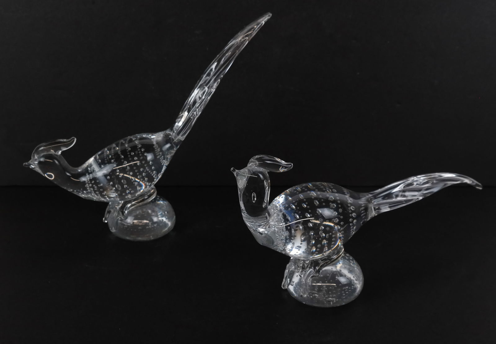Tiffin Glass Pheasant Paperweights, 2: Pair of pheasant paperweights in clear bullicante (controlled bubble) design. [9.5" H x 11.5" L]. In good condition.