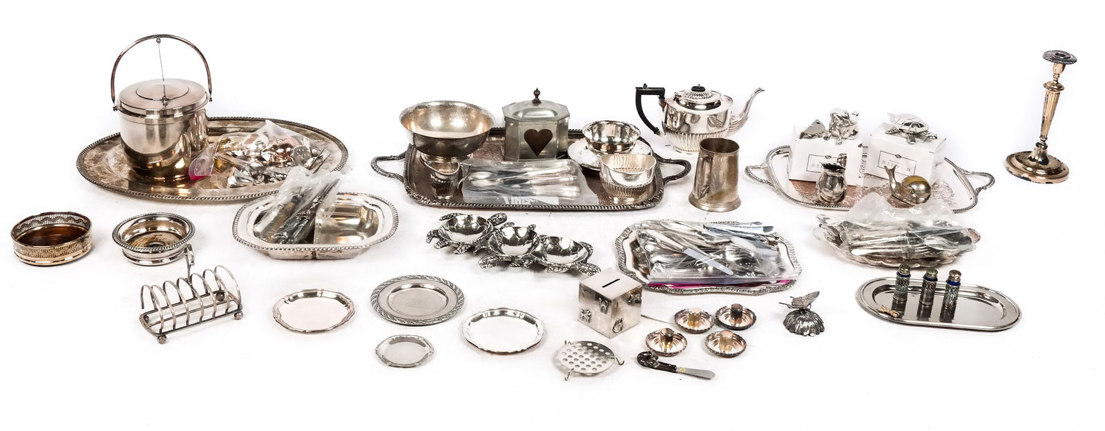 Group of Silver Plate & Assorted Metal, 50+: Group of assorted silver plate, silvered metal, pewter, and other metal items comprising wine coaster, ice bucket, six assorted trays, vegetable dish, silvered metal condiment dish, baby block bank, R