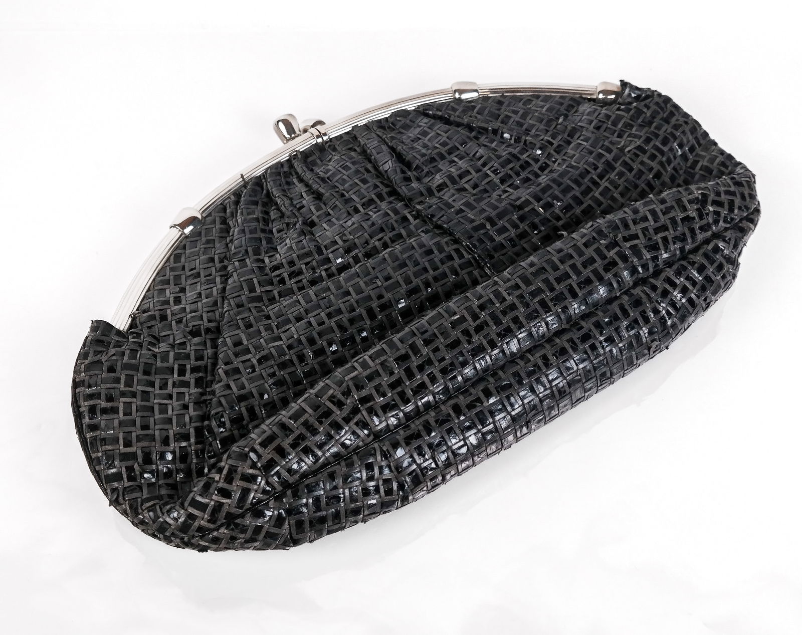 Judith Lieber Woven Python Purse: Judith Lieber woven python purse with a silver tone double-hinge opening and fabric lining, and with a removable python strap, marked Judith Lieber to inner. [Excluding strap: 11" H x 15" W]. Conditio