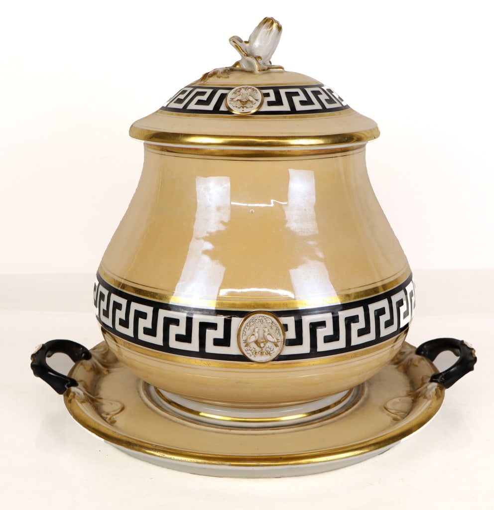KPM Porcelain Soup Tureen: KPM Porcelain soup tureen, German, 20th century, with an iridescent finish, Greek key decoration, flower finial and impressed dove medallion to lid, gilt decoration, and a two-handle tray. [Tureen, le