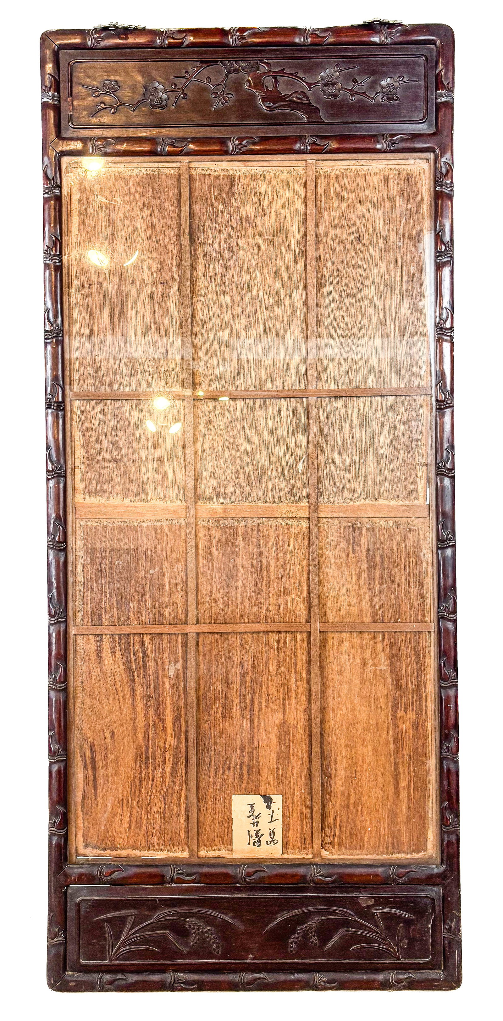 Chinese Carved Hardwood Frame: Chinese carved hardwood frame, 20th century, with foliate decoration to frame and inset glass. [67" H x 28.5" W]. Condition is good to fair with wear and paint residue to upper.
