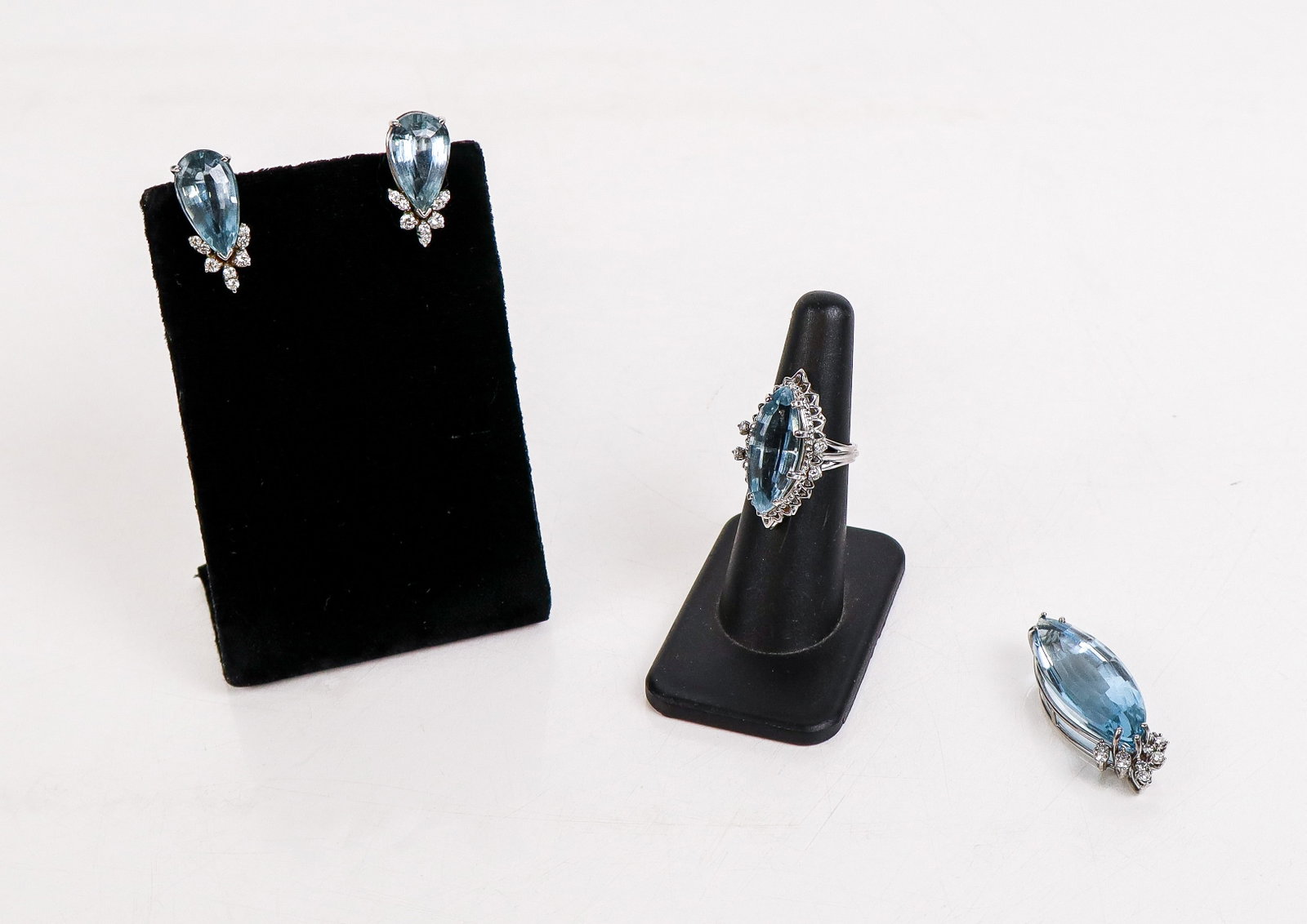 Aquamarine and Diamond Assembled Set, 4: Aset of aquamarine and diamond jewelry comprising a ring, pendant and pair of earring, containing 30 round brilliant-cut, total approximately .80 carat, earrings and pendant drop, earrings marked 14K,