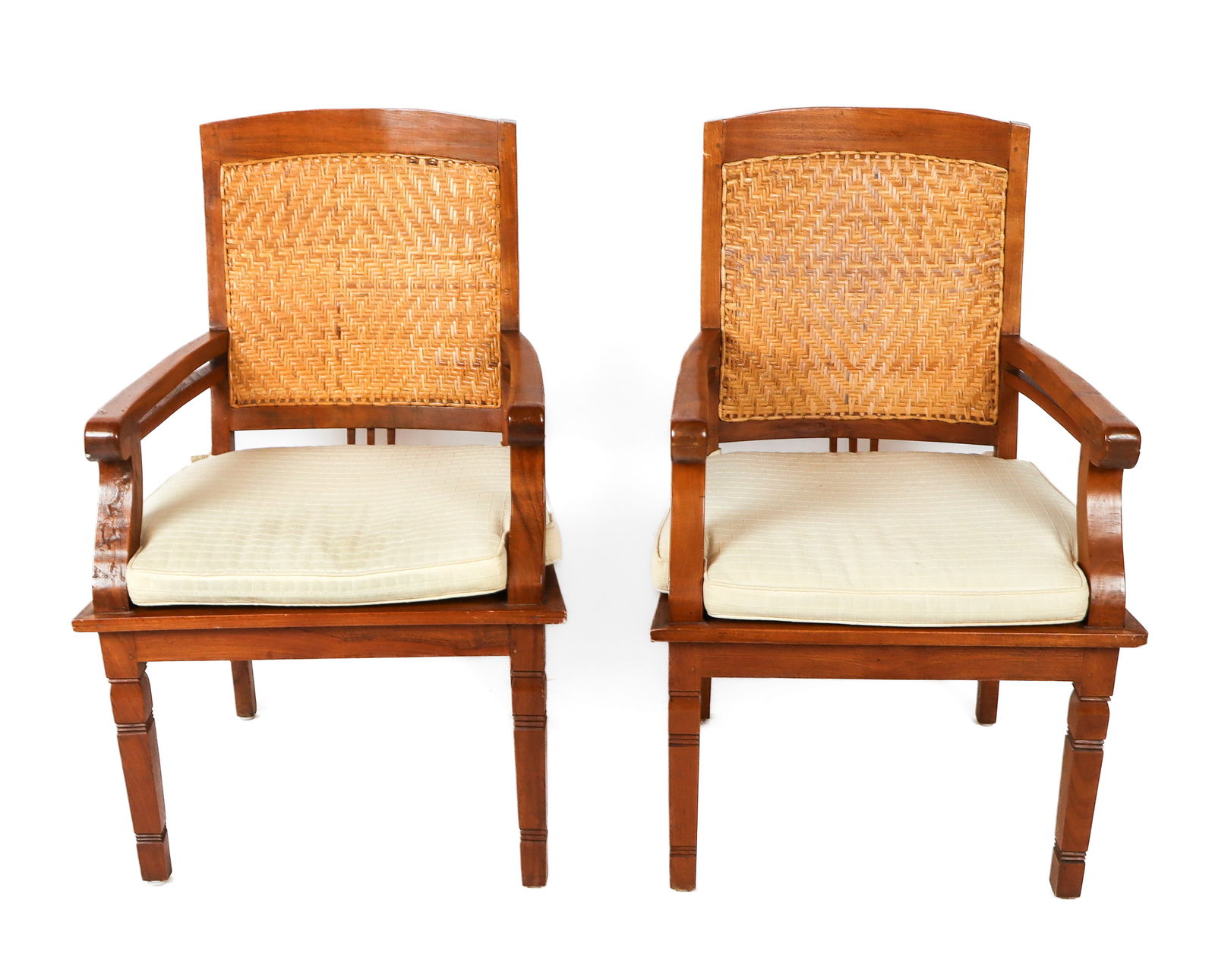 Pair of Maple and Rattan Open Armchairs: Pair of maple wood and rattan open armchairs, 20th century, with a rattan seat and backrest, seats with upholstered cushions, and carved legs. [39.5" H x 24" W x 24" D; seat height: 20]. Condition is