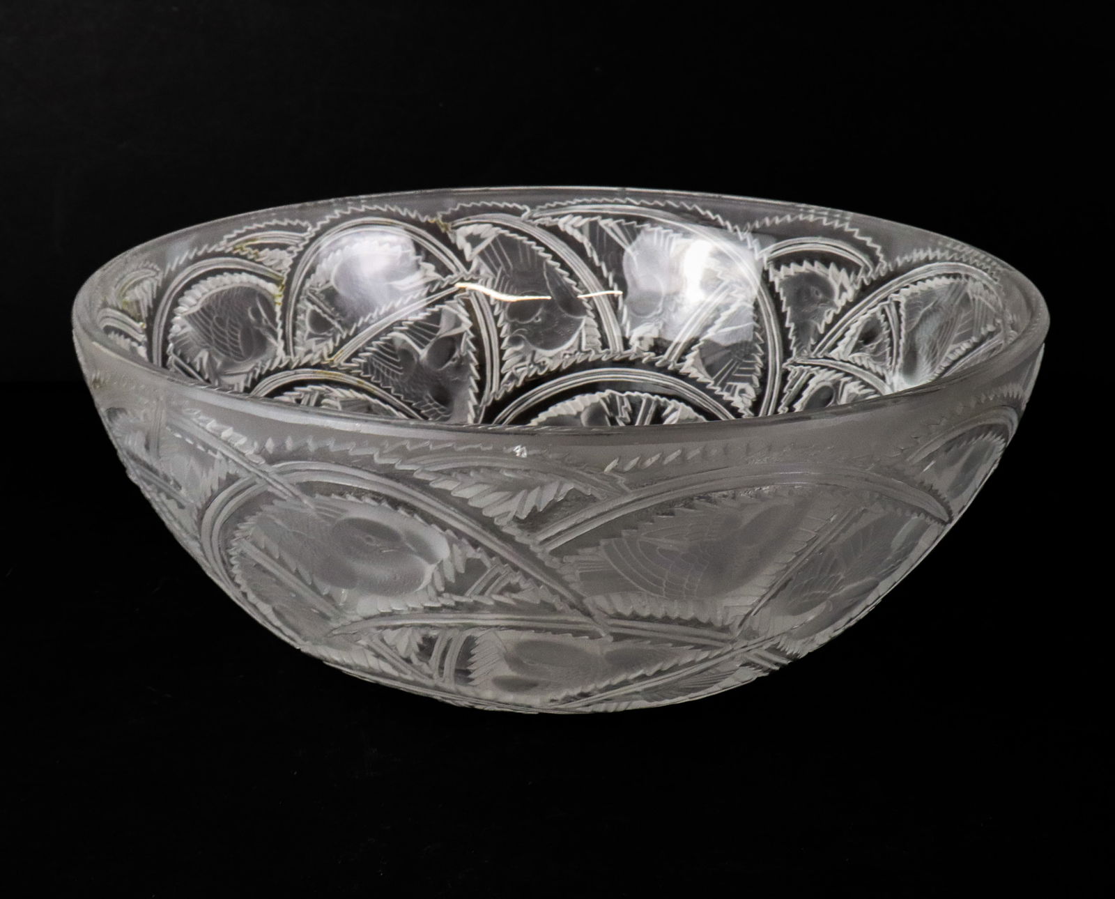 Lalique Frosted Crystal "Pinsons" Bowl: Lalique frosted glass "Pinsons" bowl, French, etched to reverse center "Lalique France". [3.75" H x 9.25" Diameter]. Overall condition is good, Estate of Lawrence Zelner of New York City.