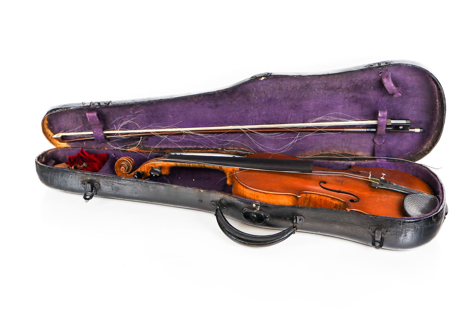 Breton Walnut Violin in Case: Breton walnut violin in case, with ebonized bridge, probably 19th century, together with pearl inlaid bow, mark to violin on neck reverse. [Violin: 23" L x 8" W]. Overall condition fair/poor, losses t