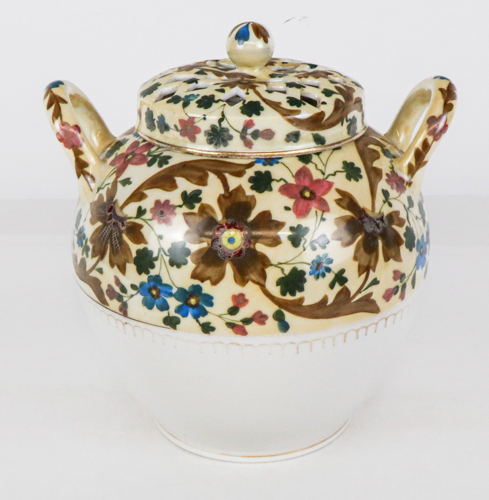 Royal Vienna Porcelain Potpourri: Royal Vienna porcelain floral decorated potpourri, mark to base. [9" H x 8.5" W x 7.5" D]. Overall condition is good, losses to decoration at lower. Estate of Priscilla and Byam K Stevens Jr.