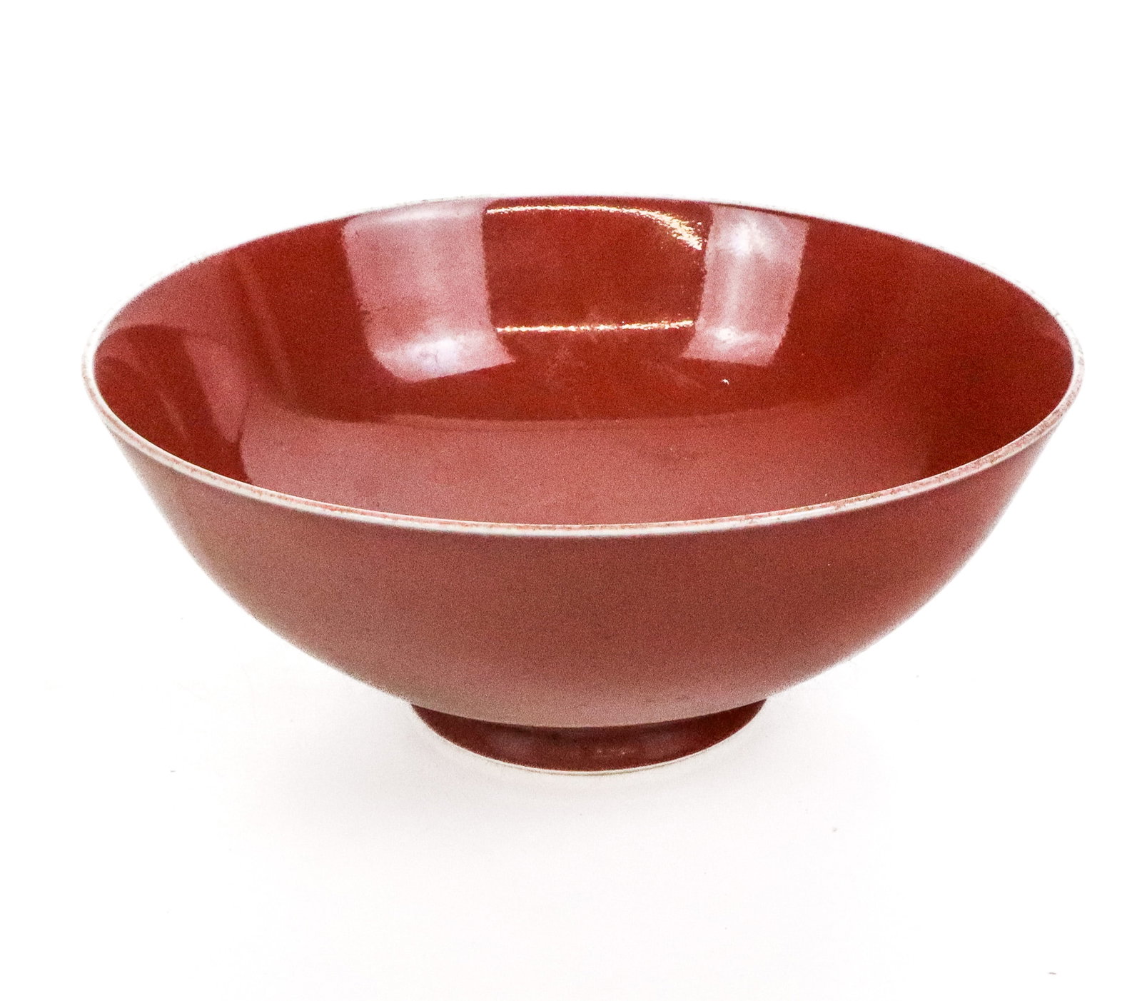 Chinese Qing Dynasty Sang de Boeuf Bowl: Chinese sang de boeuf bowl, Qing Dynasty, with marks to base. [2.5" H x 6.5" Diameter]. Condition is good with some minor surface wear.