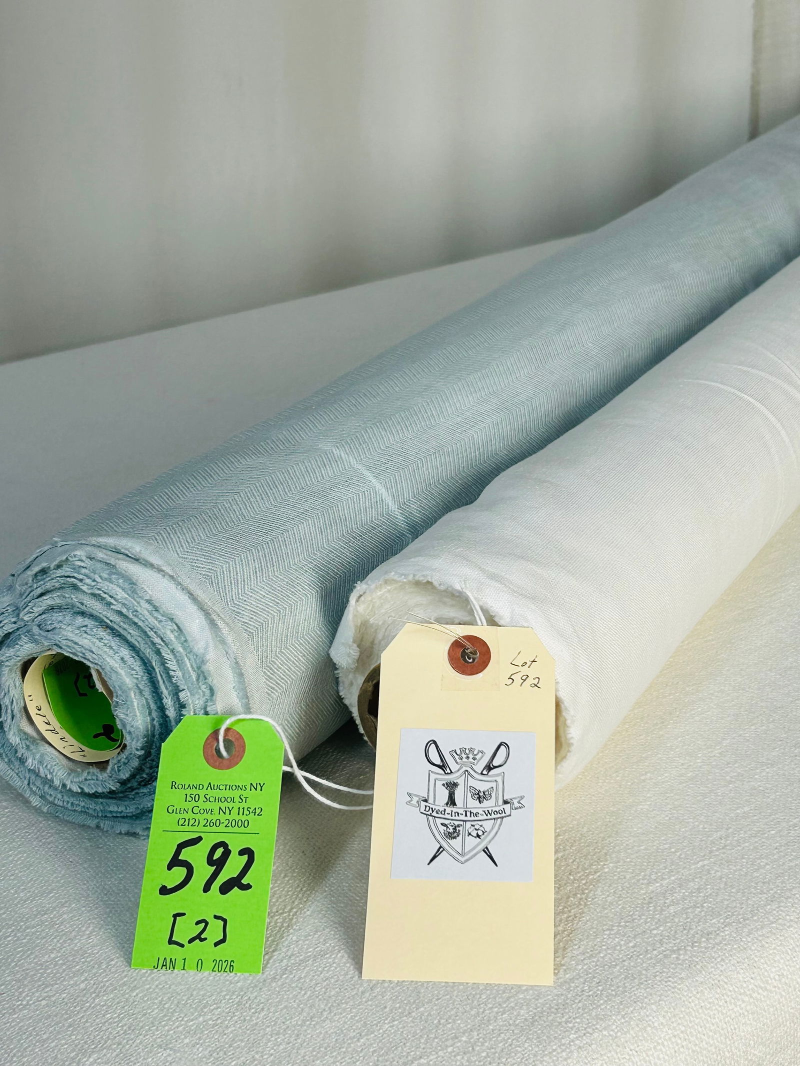 Rose Uniacke And Colefax & Fowler Linen Fabrics: 1) 14 1/2 yards of Rose Uniacke's white multi-purpose 100% linen fabric, 55" width. Has a beautiful hand and is in great condition. 2) 11 yards of Colefax & Fowler's "Lindale" 100% linen in pale aqua,