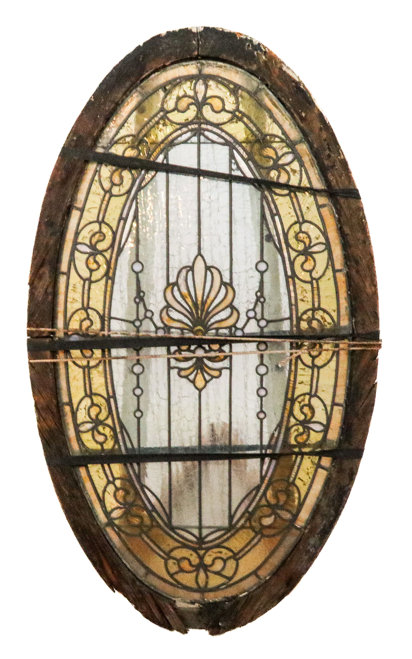 Beaux Arts and Crafts Stained Glass Window: Beaux Arts and Crafts stained glass window, American circa 1900, with a fleur de lis decorated border around a central medallion with inset slag and crackle-glaze glass. [45.5" H x 25.5" W]. Condition