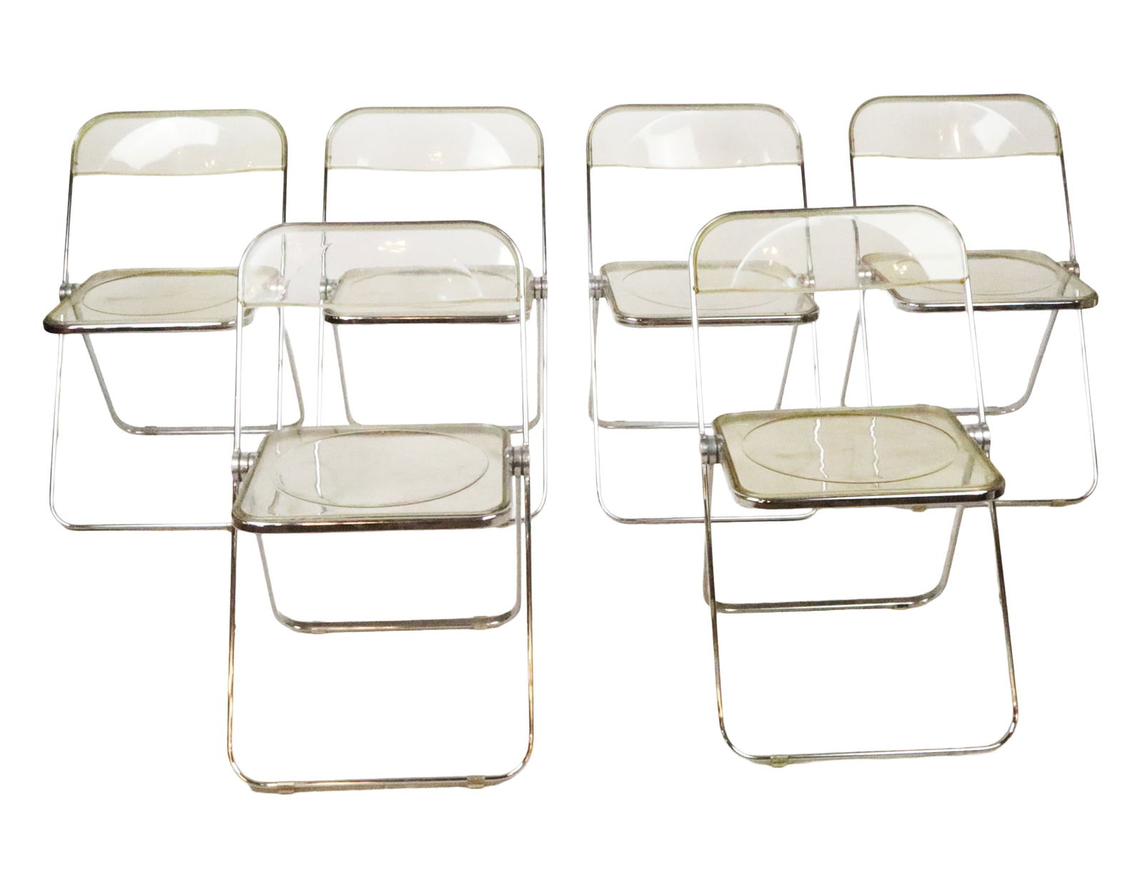 Giancarlo PIRETTI PLIA Chrome and Lucite Chairs, 6: Giancarlo Piretti Plia chrome and lucite folding chairs, mid-20th century, manufactured by Anonima Castelli, marked Plia and Patent Anonima Castelli to seat at reverse. [29" H x 20" W x 21" D; seat he