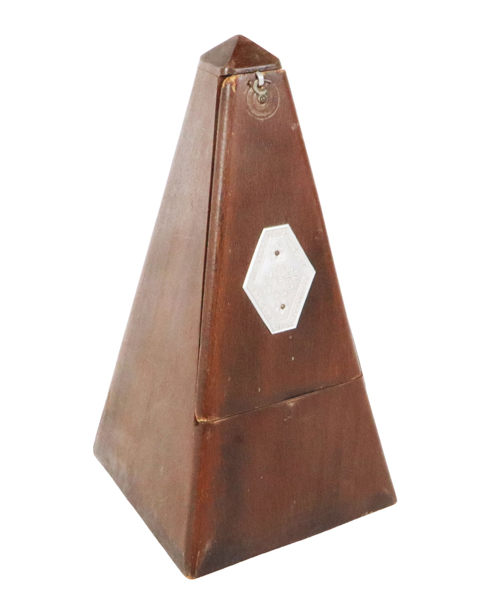 Maezel Paquet Metronome: Maezel Paquet metronome, French 20th century, with a walnut case, marked to front. [9" H x 4.5" Square]. Condition is good to fair with wear to case, functional.