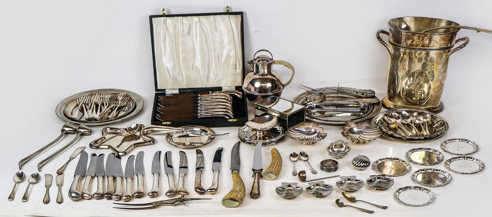 Collection of Silver Plate and Metal Items,: Collection of assorted silver plate, comprising a pair of Christolfe shell form nut dishes, a box set of Sheffield steak knives, assorted flatware and serving sets, set of 4 shell form nut dishes, a p