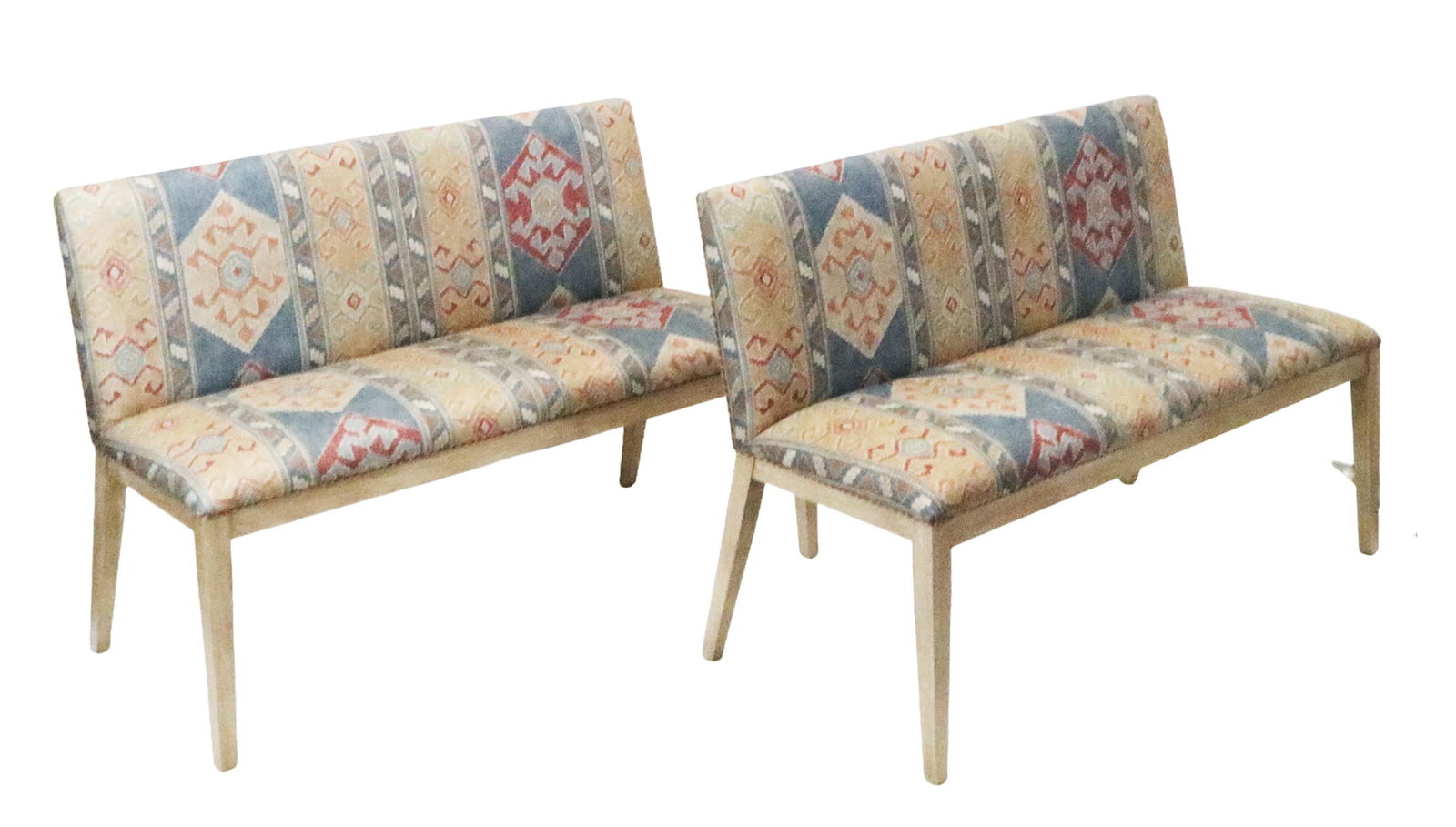 Pair Of Modernist Benches: Pair of Modernist benches (or armless settees), each in geometric colorful upholstery, in painted oak simplistic frames, late 20th century. [34" H x 52" W x 23" D]. In very good condition.