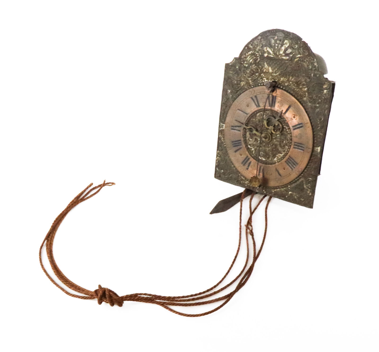 Continental Metal and Brass Wag-on-the-Wall Clock: Continental floral and etched dial clock with sweep seconds, mid 19th century, with floral embossed metal plate and etched brass dial, fancy arrow hands, and sweep seconds, with weight. [11" H x 7.75"