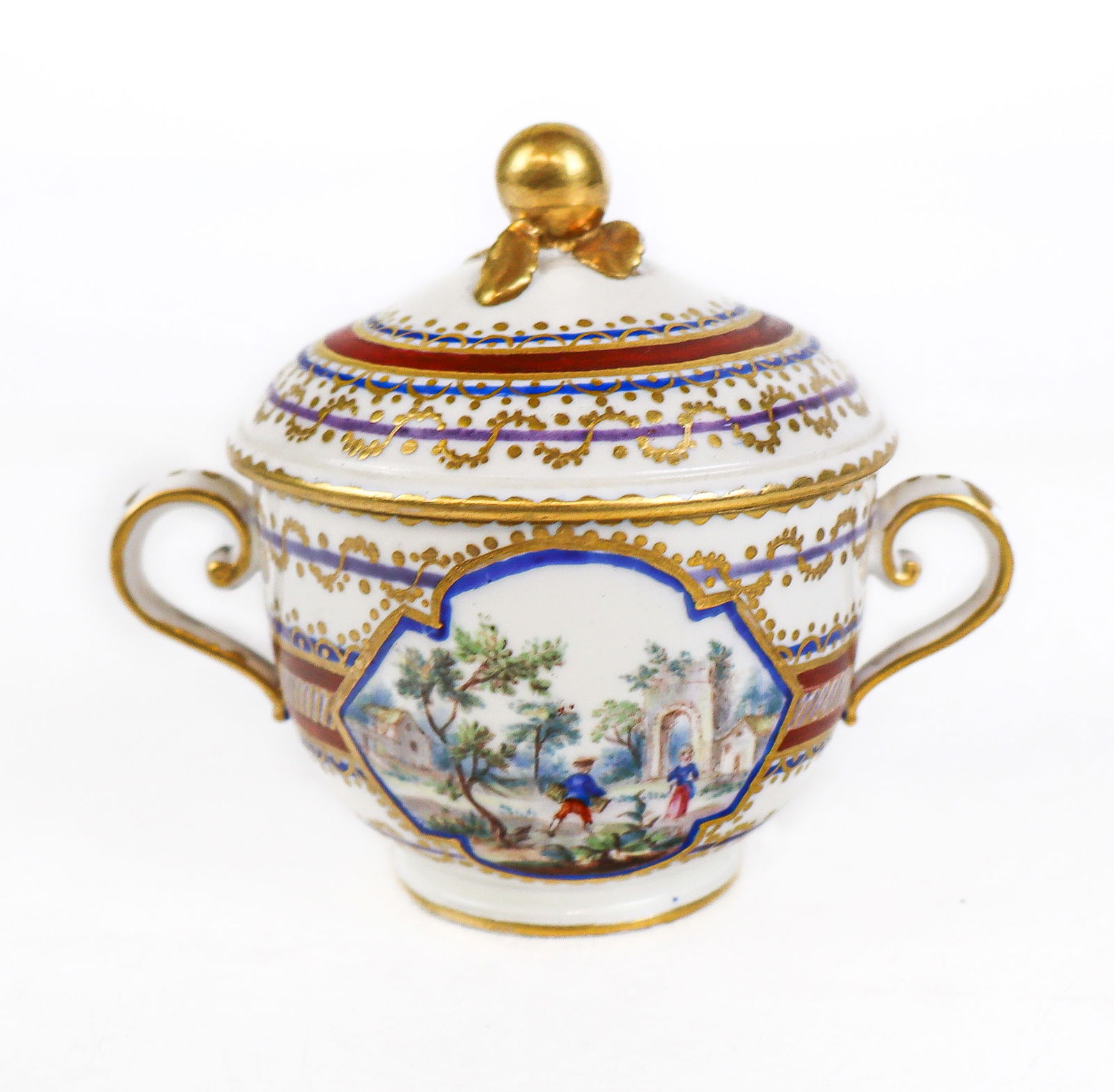 Sevres-Inspired Hand-Painted Porcelain Pot de Crem: Sevres-Inspired hand-painted porcelain pot de creme, probably French, probably circa 1740, with harbor and landscape vignettes, marks to base. [3.75 H x 4" W x 3" D]. Overall condition is good.