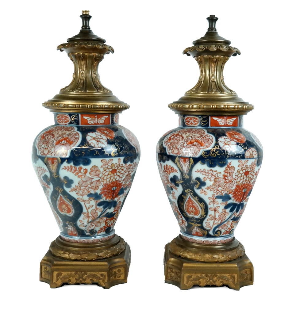 Pair of Louis XVI Gilt Metal & Imari Vase Lamps: Pair of Louis XVI gilt metal and Imari floral decorated urn form vases mounted as lamps, 20th century. [17.5" H x 7.5" Diameter]. Overall condition is good, modification evident, requires rewiring,