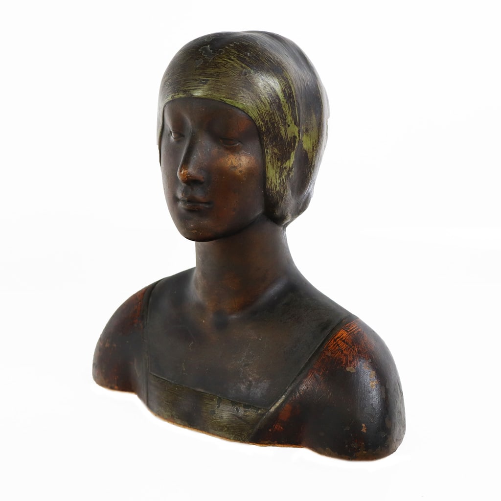 Pompeian Bronze Co. Art Deco Bronze-Clad Bust: Art Deco painted bronze-clad figure of flapper wearing a cloche, Brooklyn, first quarter of the 20th century, mark to the reverse "Pomperian Bronze Company".[10" H x 8.25" W x 5" D]. Overall
