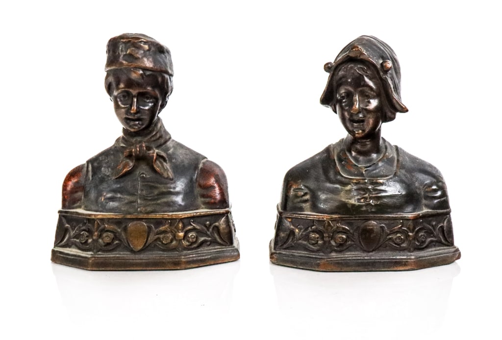 Pompeian Bronze Co. Pair of Bronze-Clad Bust Booke: Companion pair of painted bronze-clad figures of Dutch man and woman bookends, Brooklyn, first quarter of the 20th century, marks to reverse "Pompein Bronze Co. 140". [6.25" H x 6" W x 3" D]. Overall