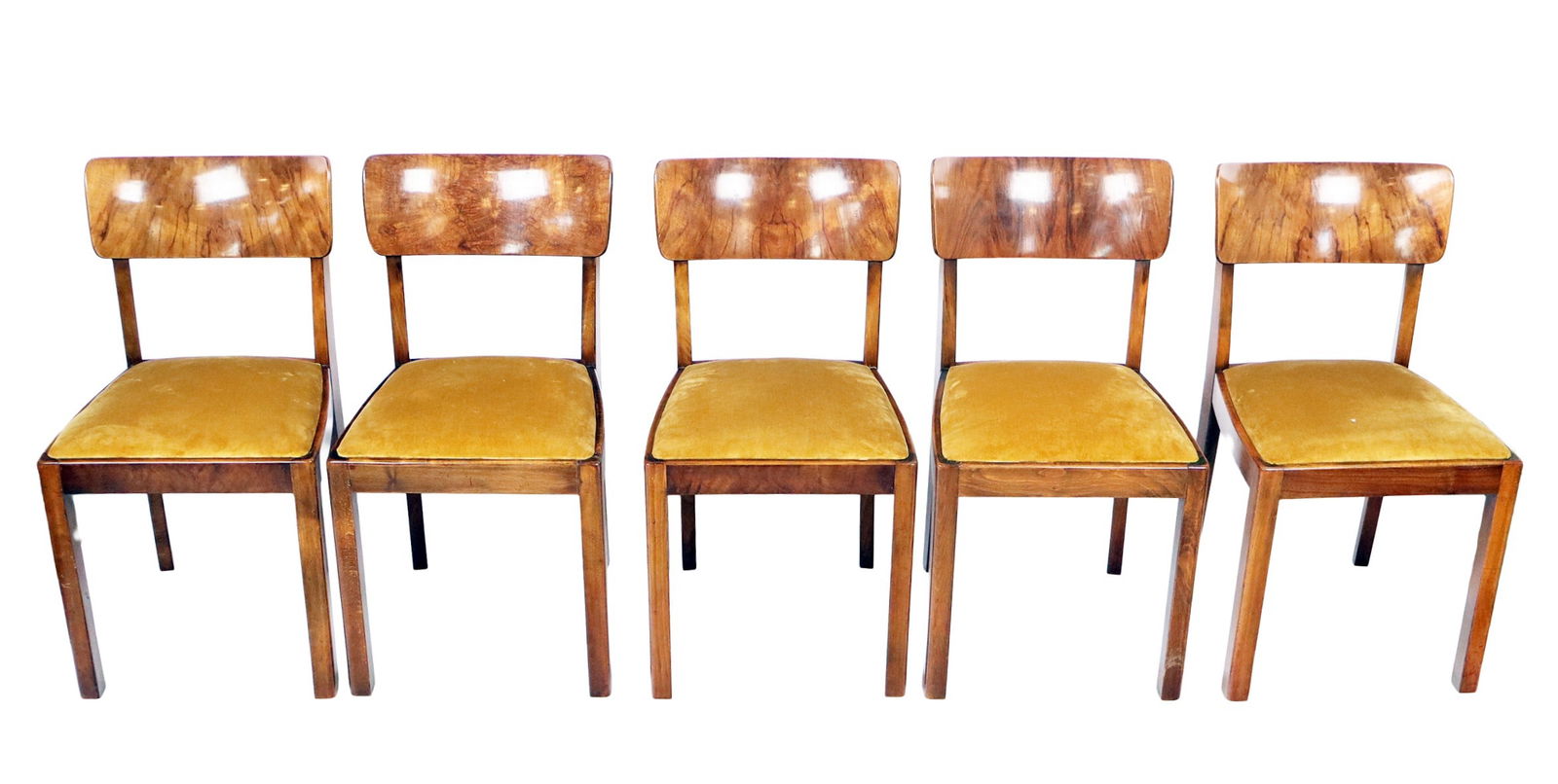 Mid-Century Modern Flame Mahogany Side Chairs, 5: Mid-Century Modern flame mahogany side chairs, mid-20th century, with velvet upholstered seats. [33" H x 17" W x 20 D]. Condition is good with some lifting to veneer, minor wear, and one chair back