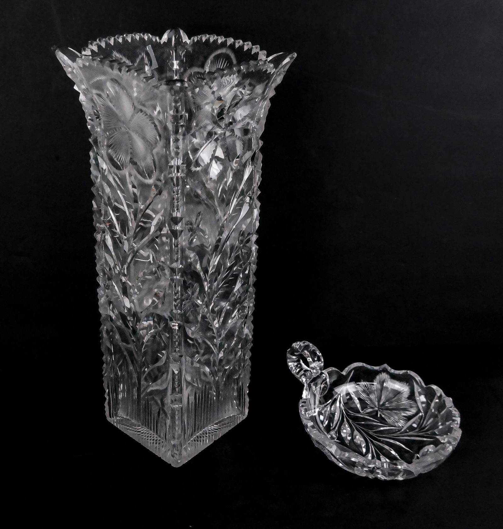 American Brilliant Period Cut Glass Vase and Candy: American Brilliant Period cut glass tall square vase and candy dish, t14he vase depicting tall flowers, the candy dish with flowers and butterfly, maker's mark to vase etched but difficult to read.