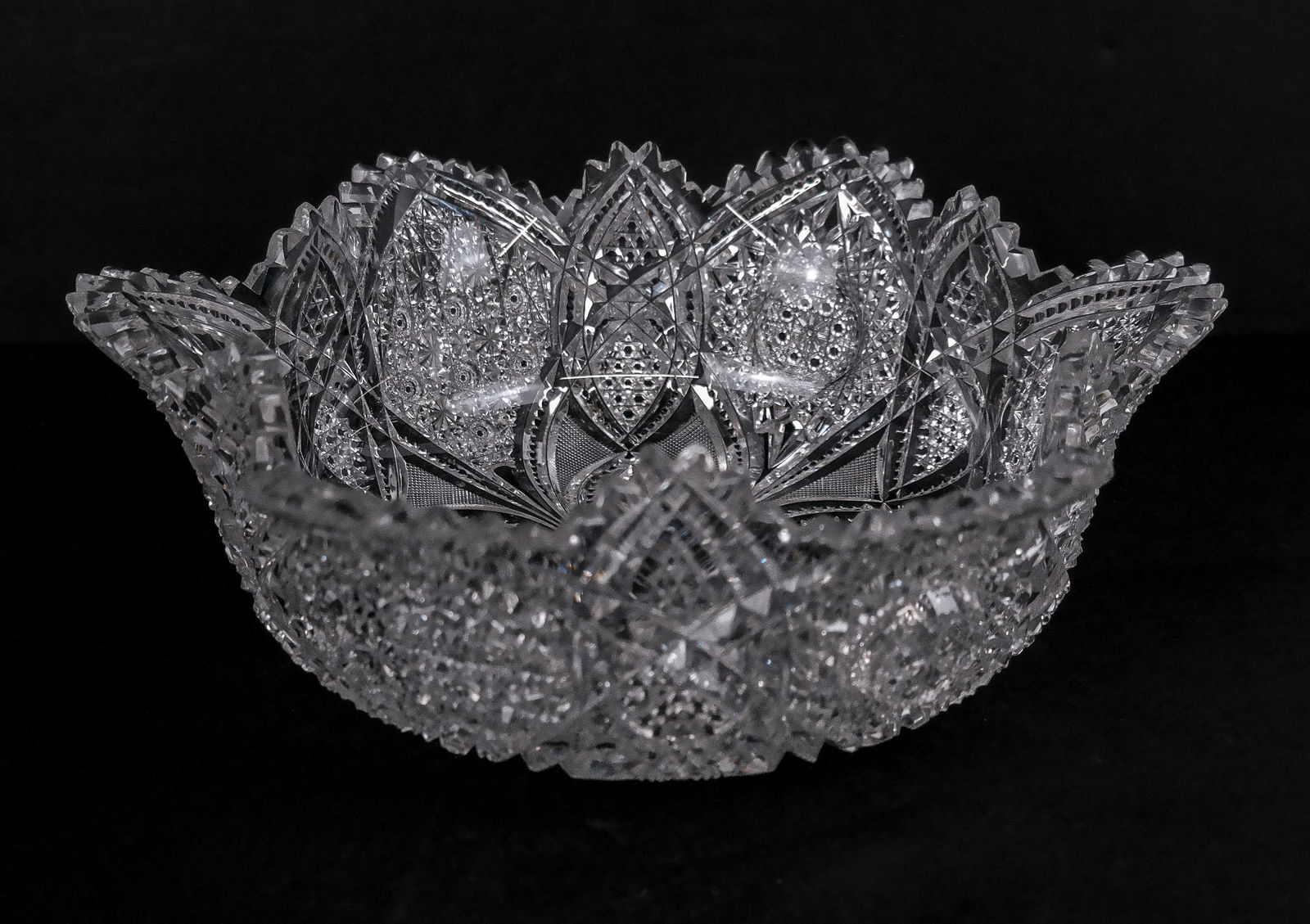 Americn Brilliant Period Cut Glass Center Bowl: American Brilliant Period cut glass center bowl, possibly Dorflinger, unmarked. [3.75" H x 11.25" Diameter]. Overall condition is good.