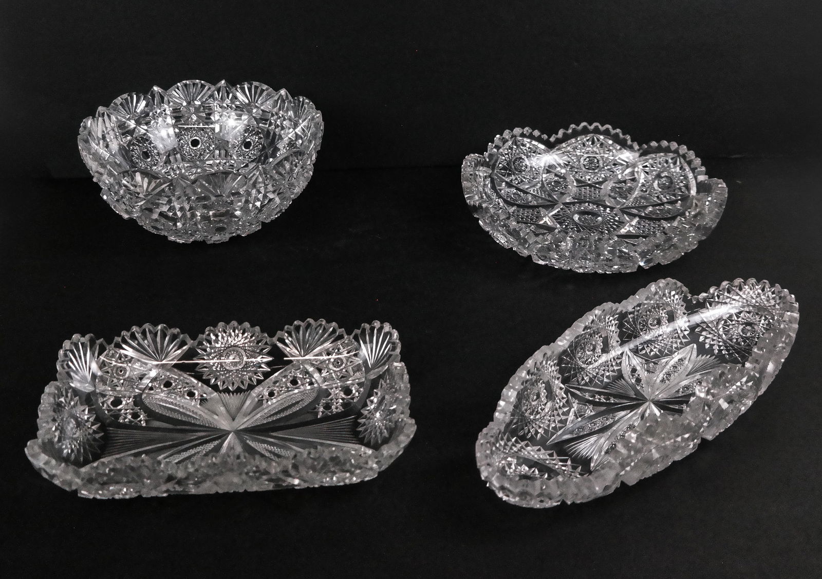 American Brilliant Period Cut Glass Tablewares, 4: American Brilliant Period cut glass tablewares in various patterns, comprising an oval relish dish [2.5" H x 12.5" L x 4.25" W], a rectangular dish [2" H x 9" L x 5.75" W], berry bowl [4" H x 8.25"