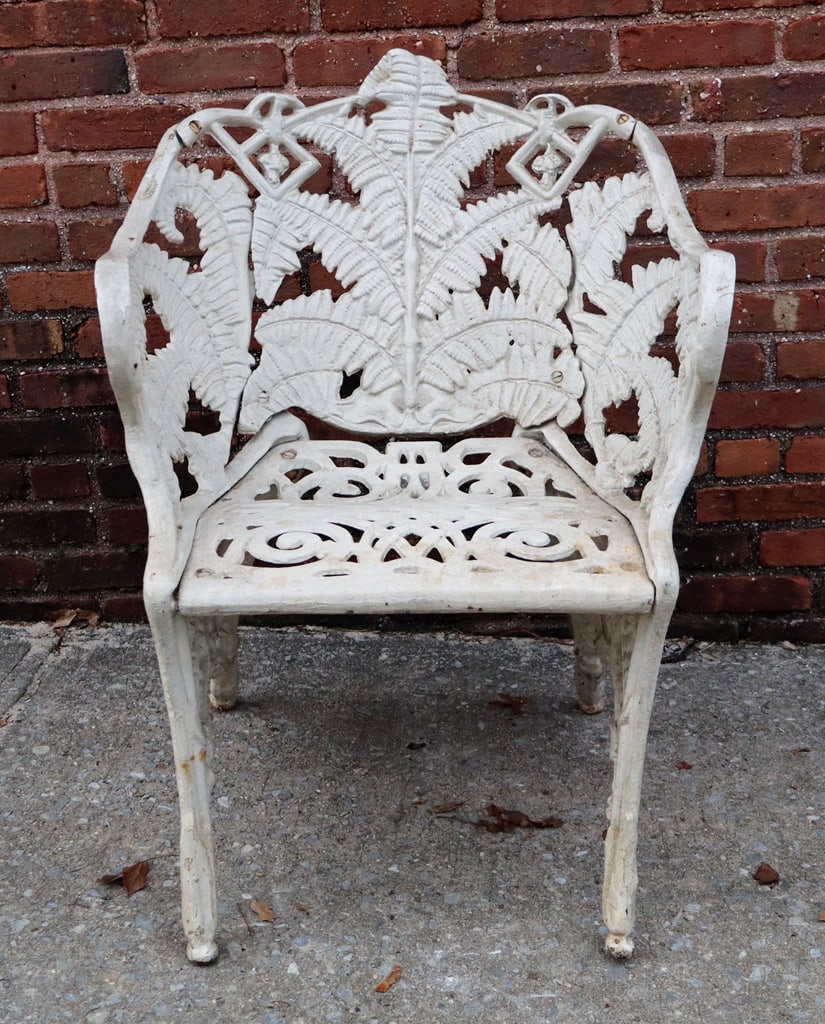 Victorian Fern and Blackberry Iron Garden Chair: Victorian Fern and blackberry pattern cast iron and white-painted garden chair, American, circa 1900. [34" H x 24" W x 20" D; seat height: 17"]. Condition is good with age-related wear. From the Colle