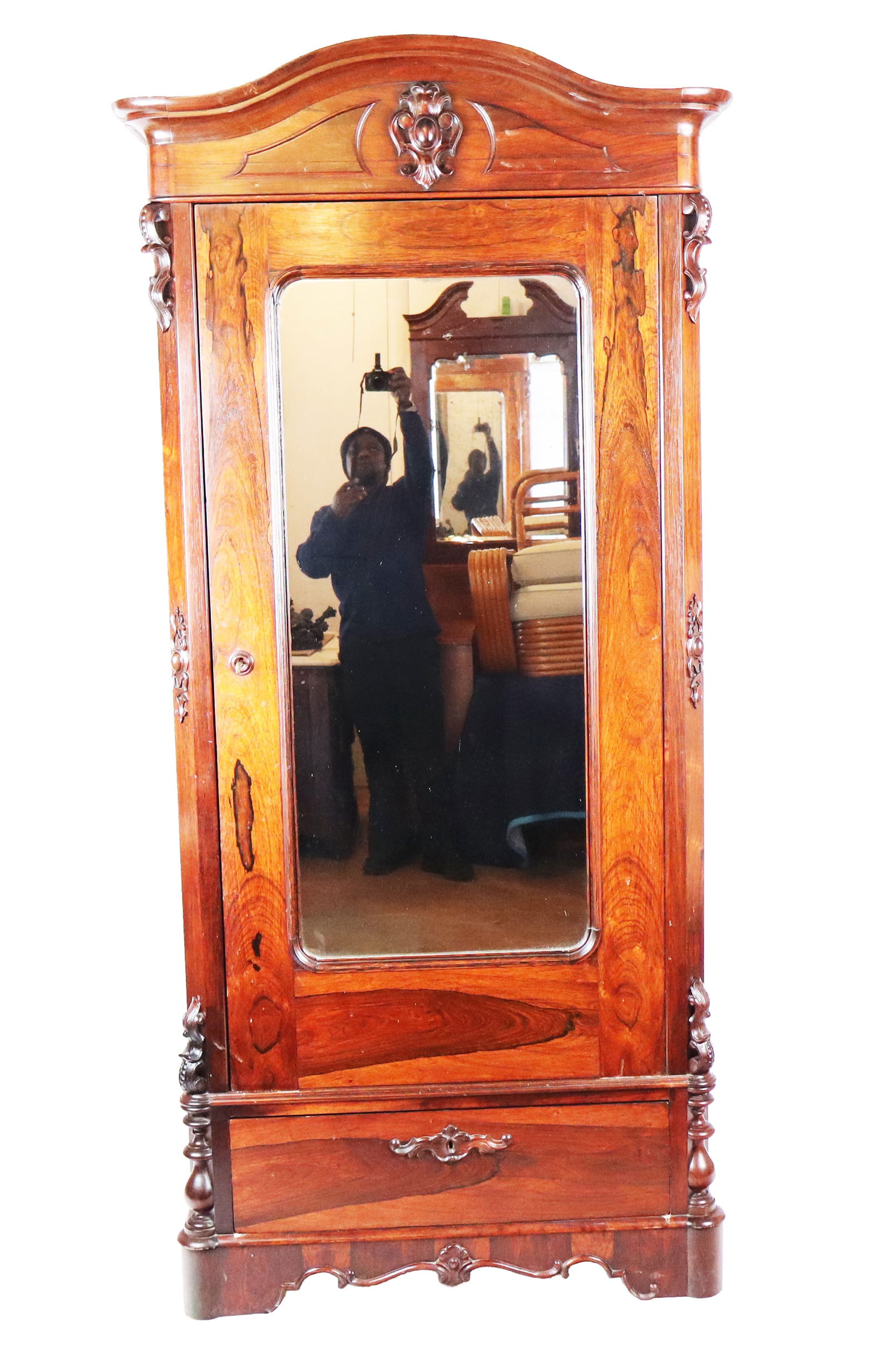 Victorian Rosewood Single Drawer Armoire: Victorian Rosewood Single Drawer Armoire, 19th century, having carved foliate details and a rounded mirror. [Approximately: 92" H x 42" W x 25" D]. Mirror loose, taped. Otherwise good condition, as wi