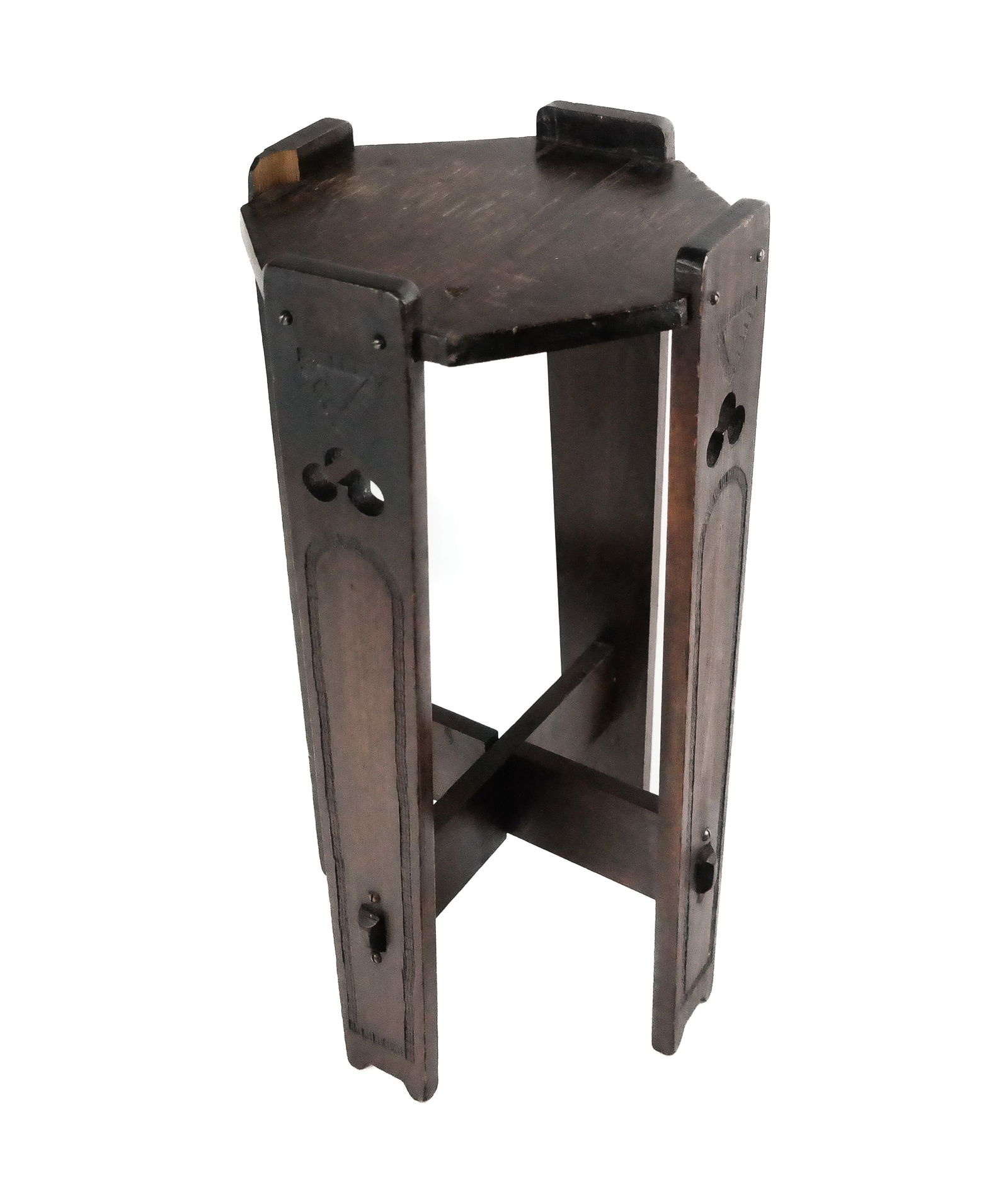 Arts and Crafts Carved Wood Plant Stand: Arts and Crafts carved wood plant stand, England, early 20th century, with an octagonal top and carved and pierced legs, signed William Tesseyman to underside. [19" H x 9.75" Diameter]. Condition is