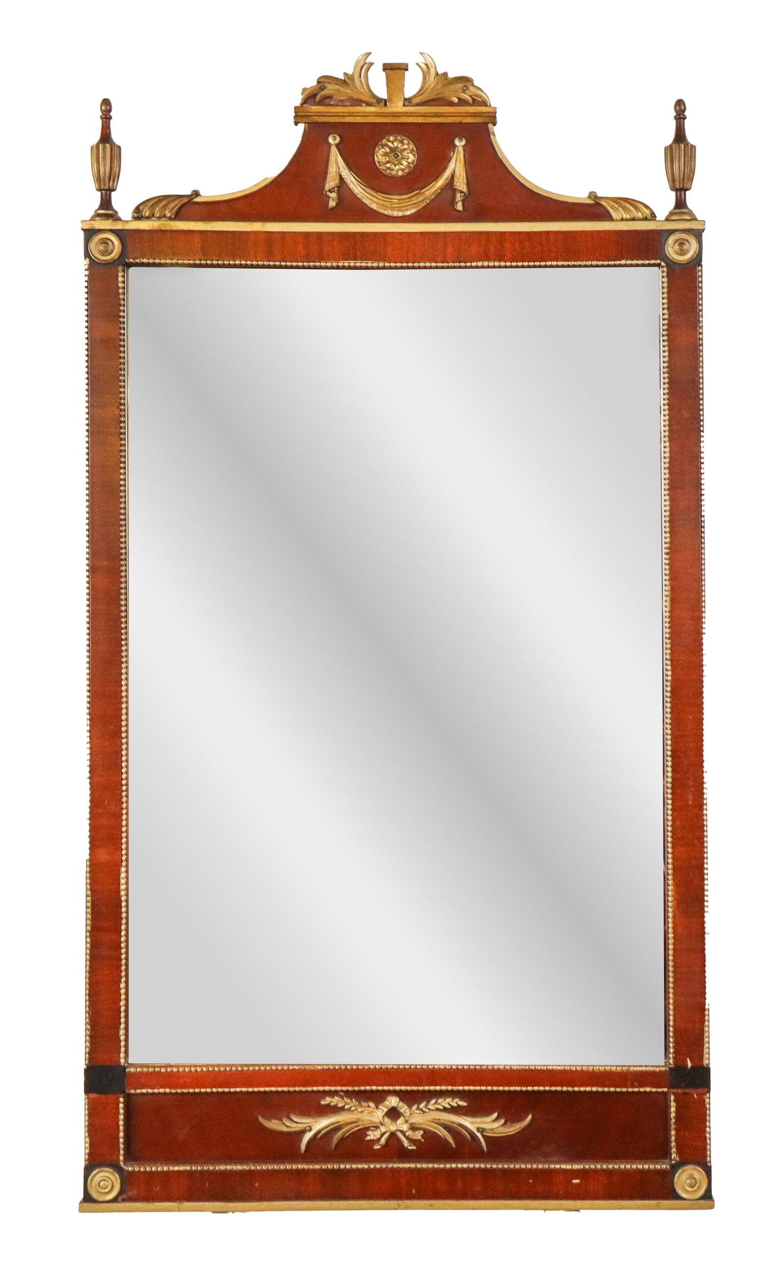 George III Mahogany and Bronze Dore Mirror: George III mahogany and bronze dore mounted mirror, 20th century, with beveled glass, a pediment to center and urn form finials to upper, cockbeaded detail, and an applique to lower. [36.5" H x 20" W]